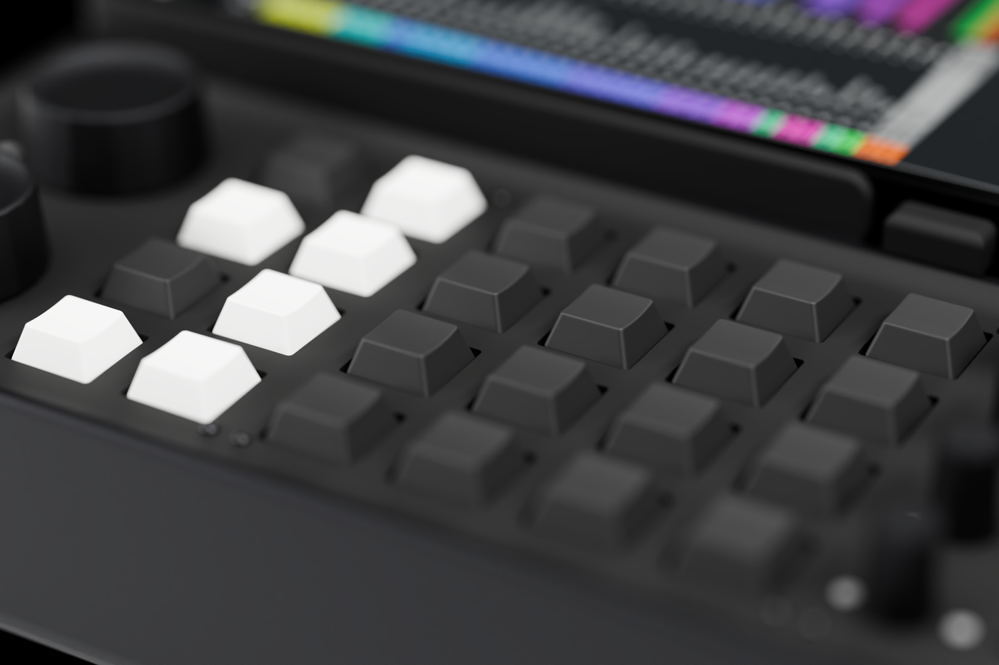 Close-up of the control panel: a large encoder, white transport buttons and the grid of beat pads.